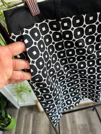 Image 2 of white and black shorts 