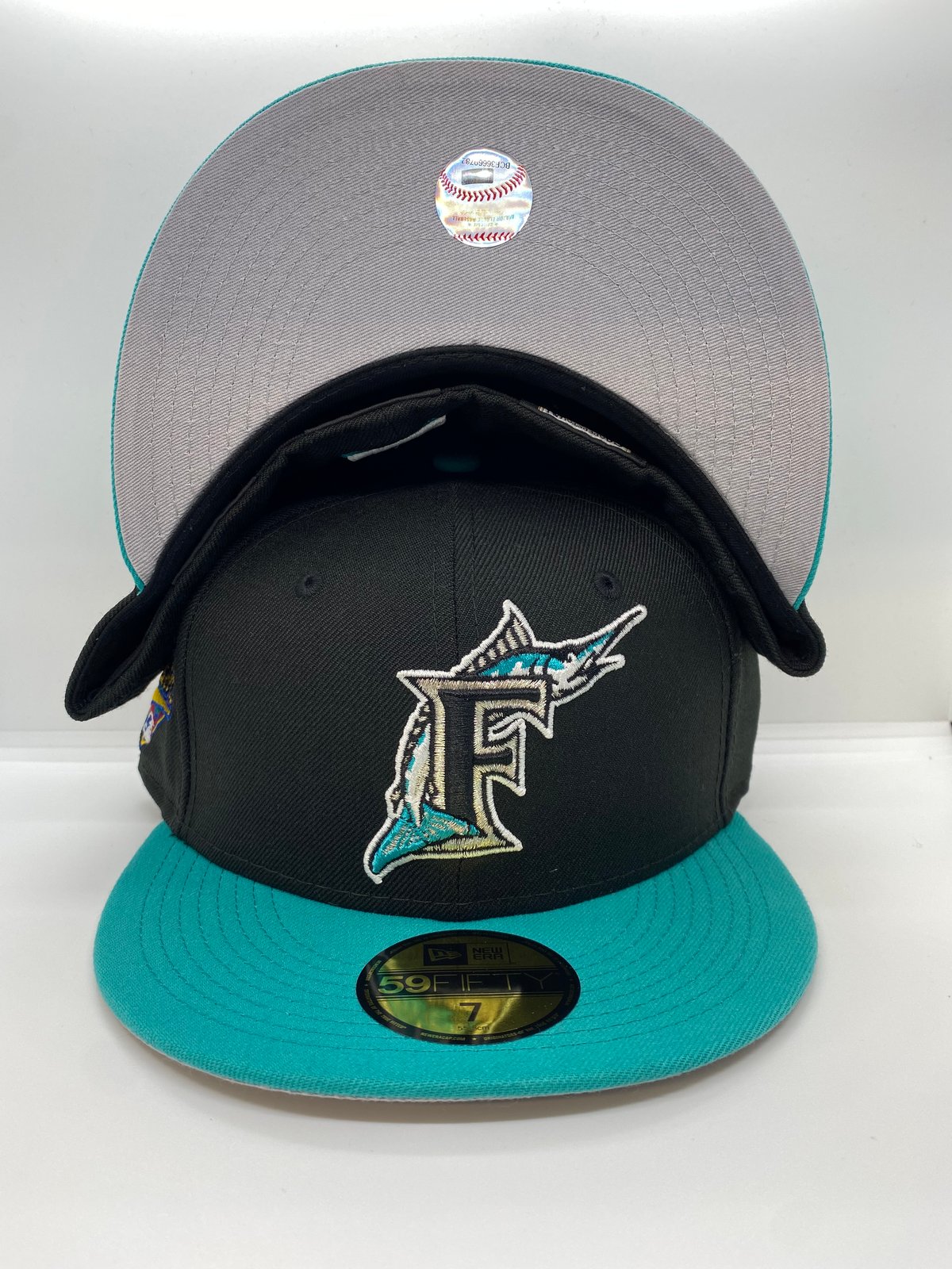 teal marlins hat