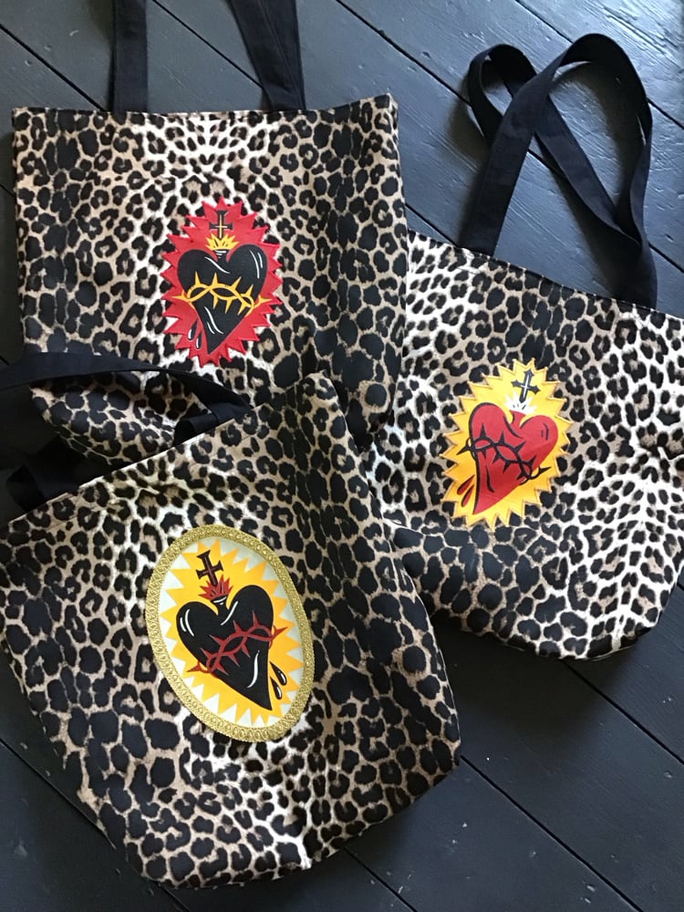 new dark leopard sacred heart bag