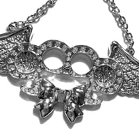 Image 2 of musical angel brass knuckle necklace *clear*
