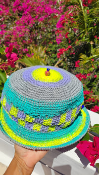Image 2 of Connected Crochet Cosmic Cap