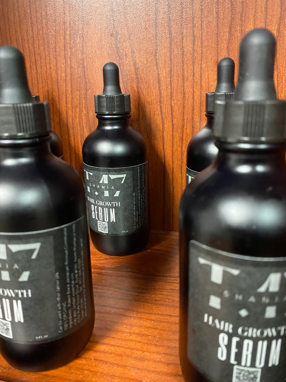 Image of Shania T.17  4 Fl. oz (Potent Serum) to add to all your hair care routine products 