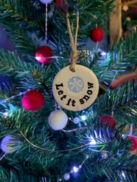 Image 1 of Let it snow tags. Set of 2.