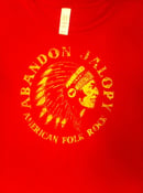 Image of Red AJ T-shirt with machine sewn "Ltd" badge