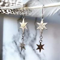 Image 1 of Handmade silver cosmic star dangly earrings. Celestial silver starry earrings. 