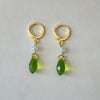 green gold huggie earrings