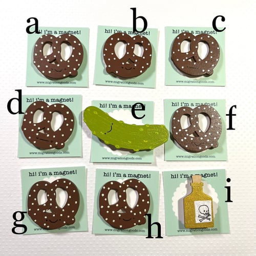 Image of handpainted pretzel (and a pickle and some poison) magnets