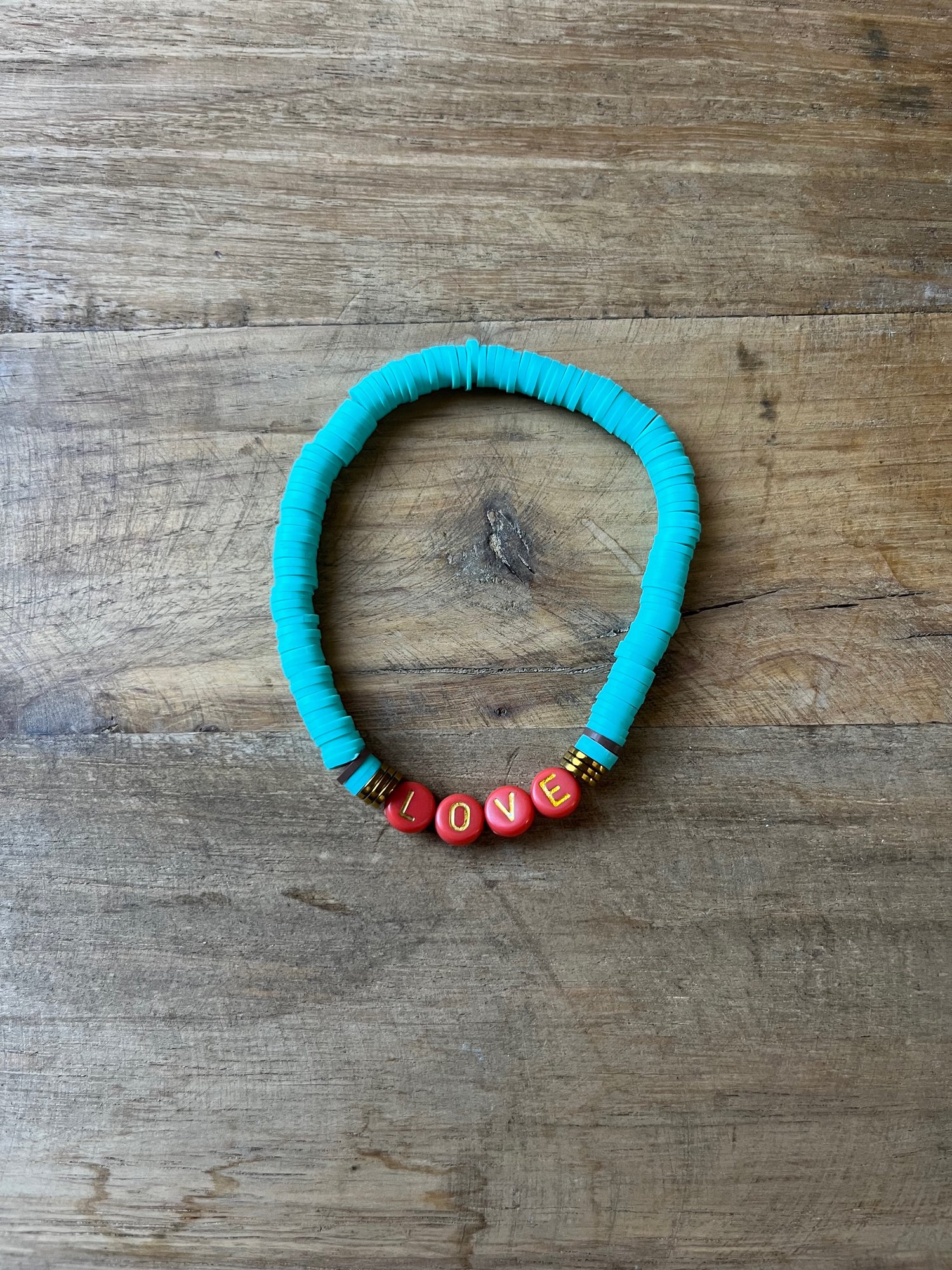 Image of Turquoise & Orange LOVE bracelet