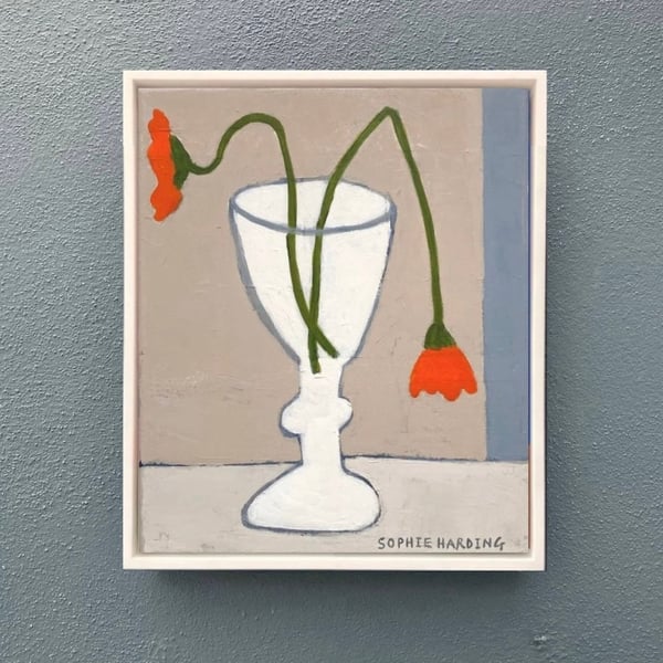 Image of Marigolds in a Wine Glass