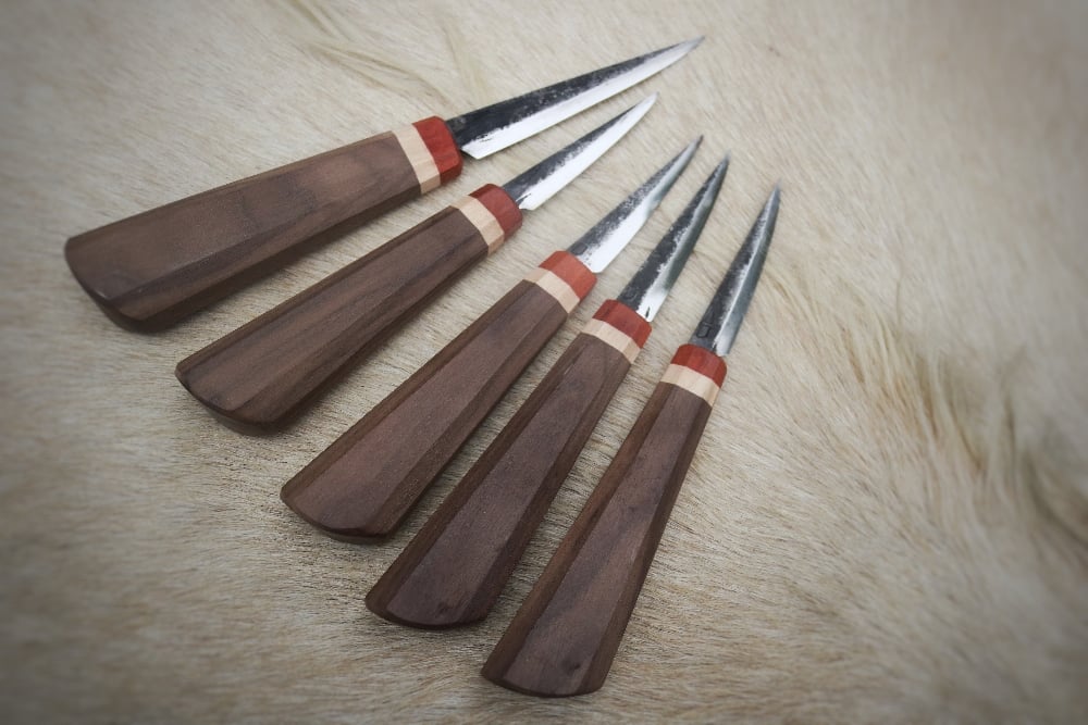 Image of 70mm and 100mm slöjd with walnut, maple and padauk handle