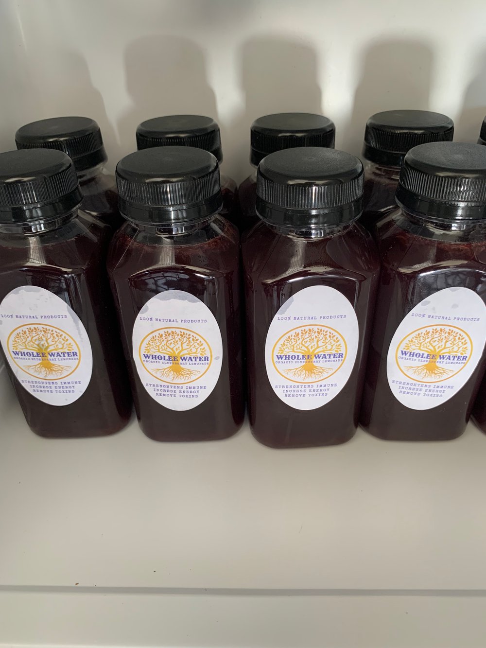 8oz Wholee Water Organic Kiwi Elderberry Lemonade