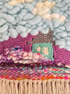 Little blue house in the Candy Mountains. Woven wall hanging.