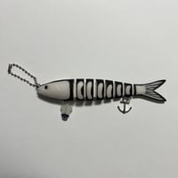 Image 2 of blue/purple glow in the dark skeleton trout keychain