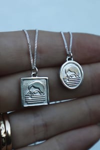 Image 1 of DROWNING GIRL PENDANTS