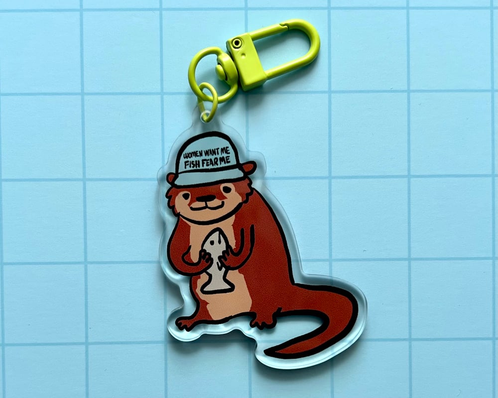 Image of Fisherman otter acrylic charm/keychain