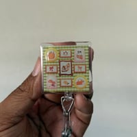 Image 1 of Magical Holiday Frame Badge Reel