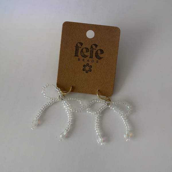 Image of heartstring bow earrings