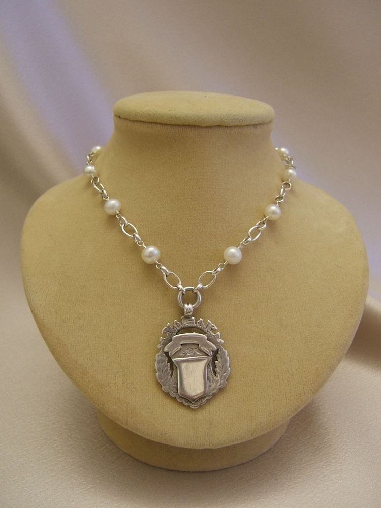 Image of Double Sided Shield with White Pearls 4KN