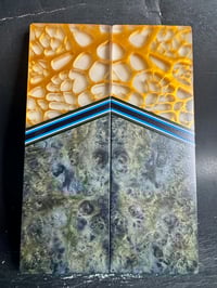 Image 2 of @Kaoticartworks 3-D Resin & Blue Amboyna Burl GLOW Segmented Knife Scales