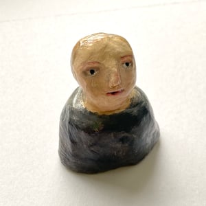 Image of A merry woman - sculpted clay artwork