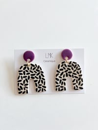 Paire de boucles d'oreilles céramique COWB violet 