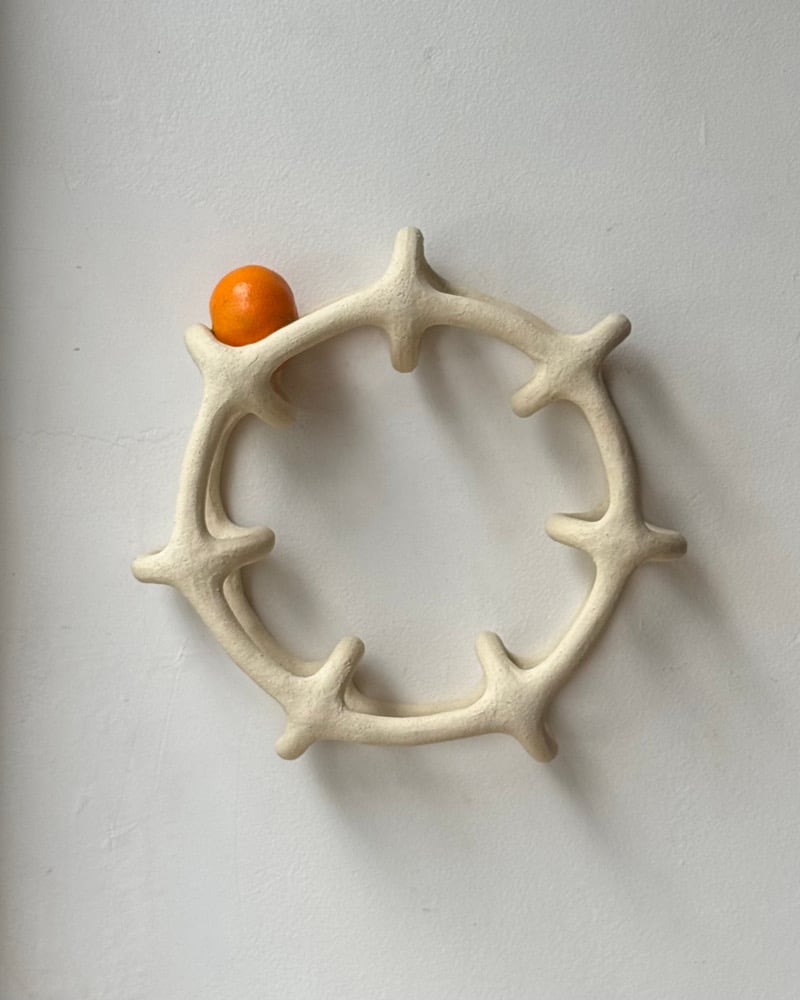 Image of Small beige wheel