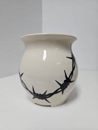 Image 2 of barbed planter (1)
