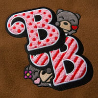 Image 3 of Bimsee Bear’s “Love Comes Full Circle” Varsity Jacket