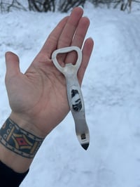 White buffalo bottle opener