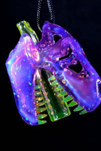 Image 5 of Chunky opal royal jelly Trex skull pendant with uv teeth & joint tip