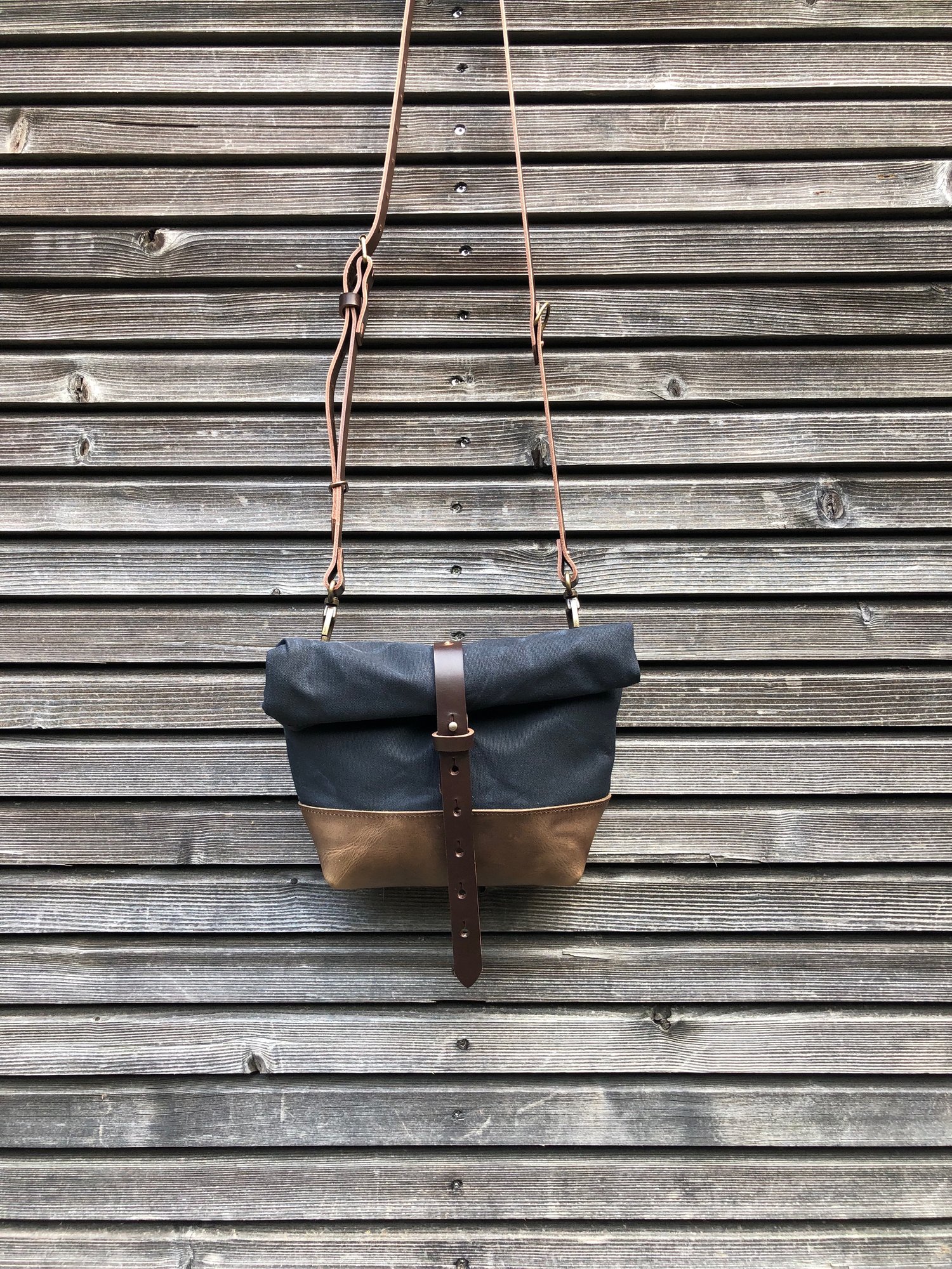 Image of Satchel in black waxed canvas with leather base