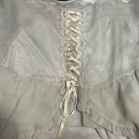 Image 4 of Axes Femme cape
