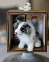 Pipe cleaner miniature border collie with its magnetic wooden display