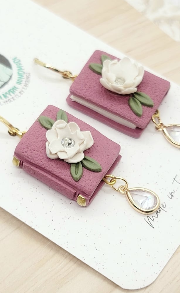 Image of Floral Book Dangles in Mauve