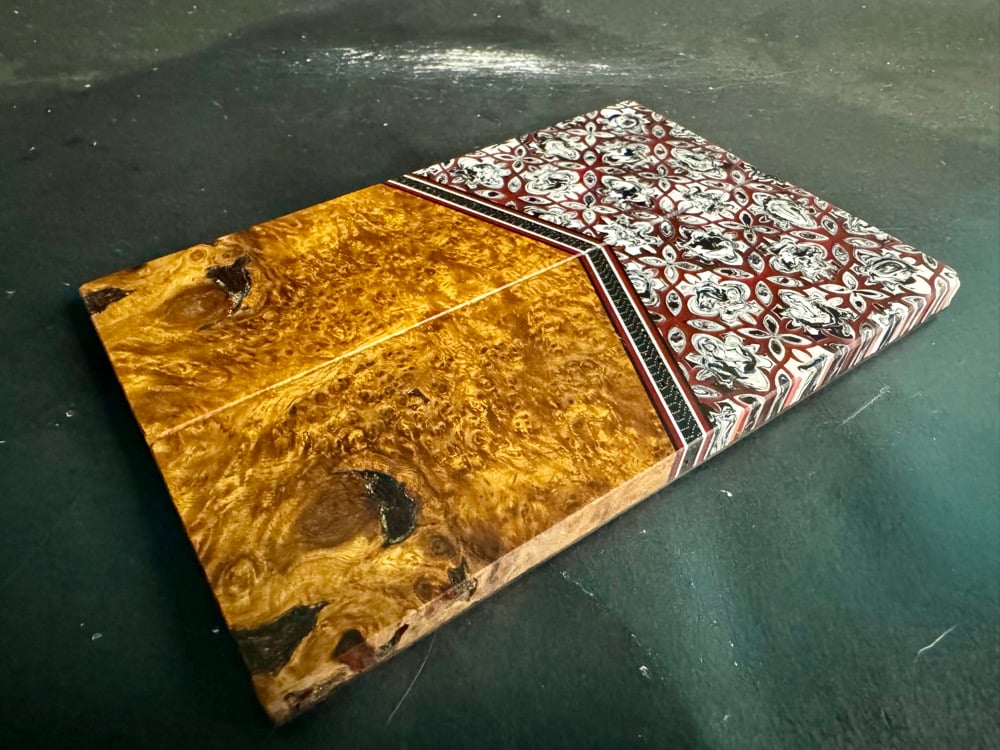 Image of @Kaoticartworks Resin & Amboyna Burl Segmented Knife Scales