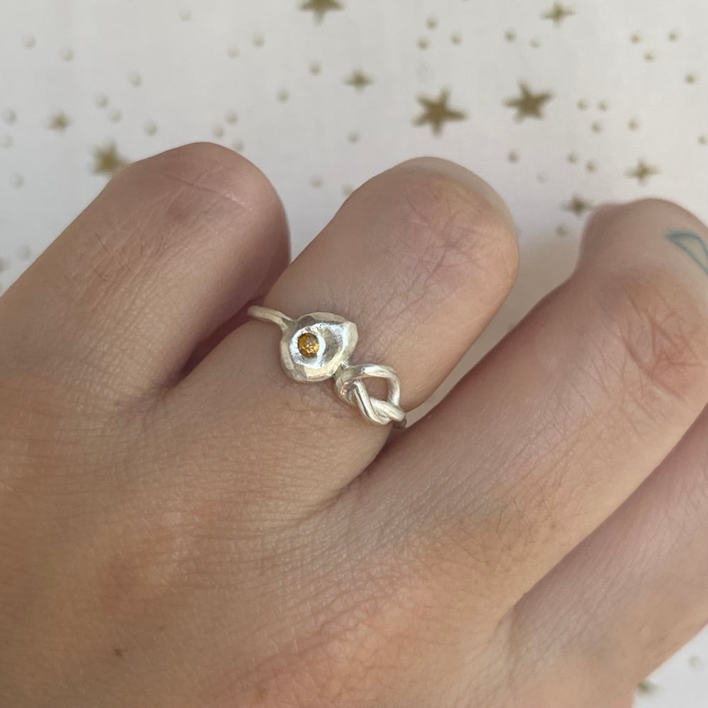 Image of yellow knot ring