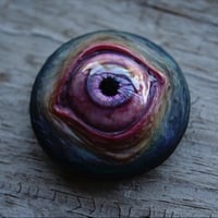 Image 3 of Custom Swappable Phone Grip for smartphones, reflective pupil, pink glow in the dark