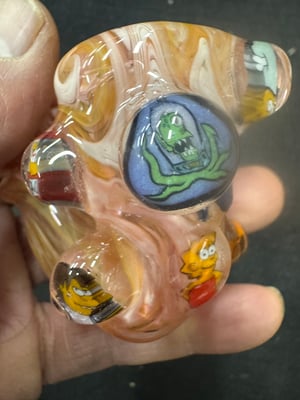 Image of Simpsons hand jammin Sherlock 