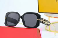 Black And Gold Sunglasses