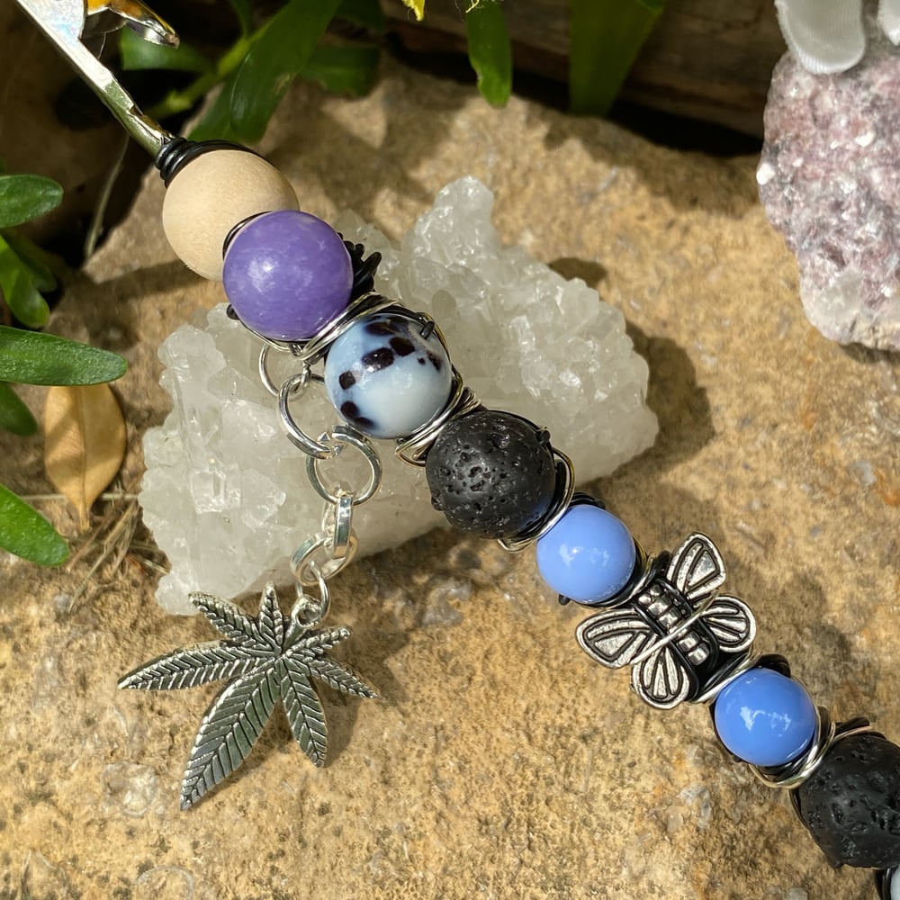 Image of midnight butterfly roach clip