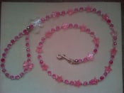 Image of Transparent and pink crystal beaded dog lead.