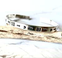 Image 1 of Luna symbol silver stamped cuff bracelet. Handmade crescent moon patterned bracelet (6mm)
