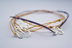 Image of Coloured cord friendship bracelets with Hammered silver charms
