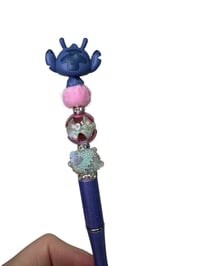 Image 2 of Alien With Doll Pen