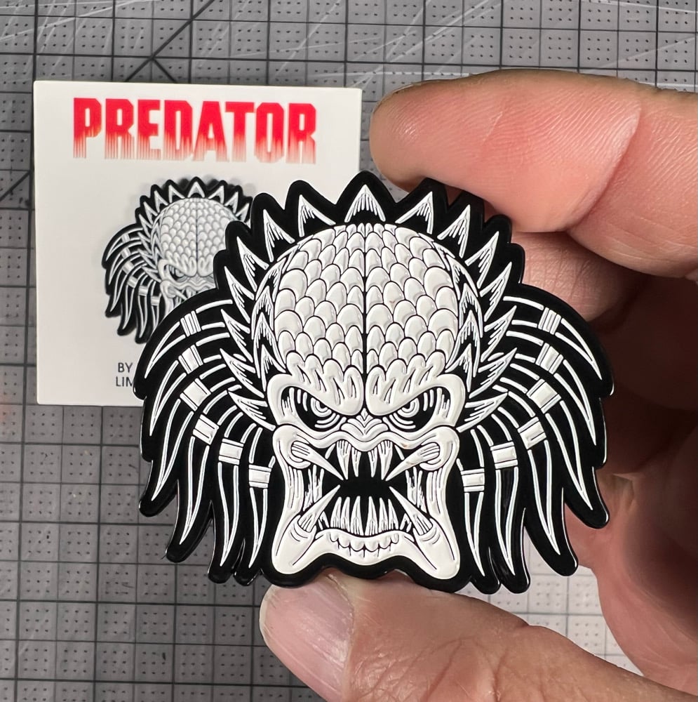 Predator enamel pin