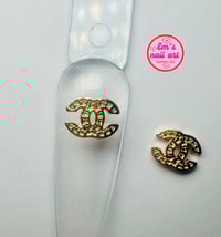 C- logo in rose gold 