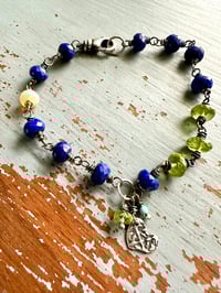 Image 1 of lapis and peridot charm bracelet