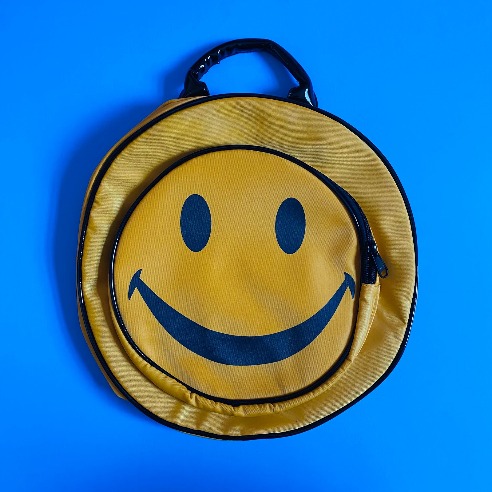 smiley face backpack 90s