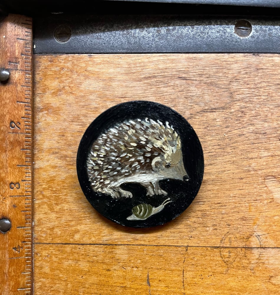 Image of Hedgehog and snail brooch 