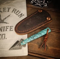 Image 1 of BROKEN ARROW • blue with black web